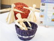 Traditional corn husk dolls were on display.