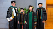 Sherry Huang, M.D., Vice Provost and Senior Associate Dean for Education (second from right), is joined in a celebratory graduation photo with Associate Deans for Student Affairs (from left): Blake Barker, M.D., Sarah Baker, M.D., and Norberto Rodriguez-Baez, M.D.