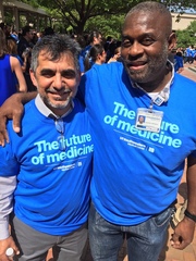 Manny Soomro (left) and Ulysses Johnson of Facilities Management soaked up the atmosphere.