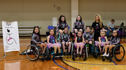 Members of Ayita Wheelchair Dance pose for a group picture.