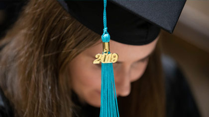 Woman with graduation cap