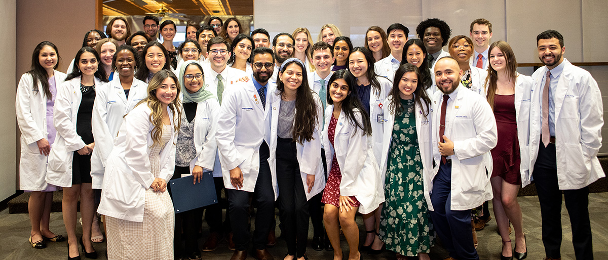 Group photo of 42 new members of the Gold Humanism Honor Society 