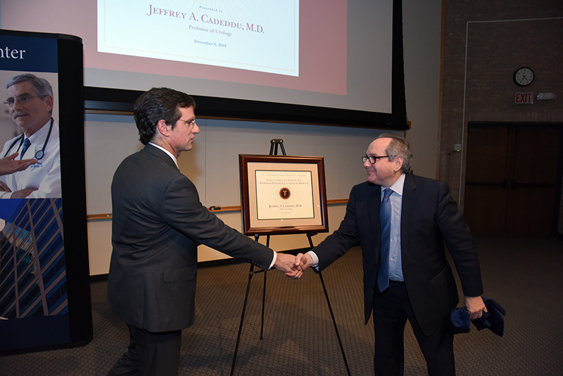 Dr. Podolsky (right) congratulates Dr. Cadeddu on being named the 2018 Watson Award recipient.