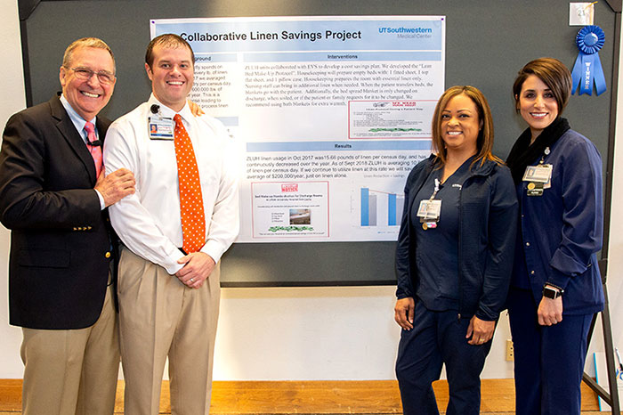 Keynote speaker with representatives of the winning Financial Stewardship poster