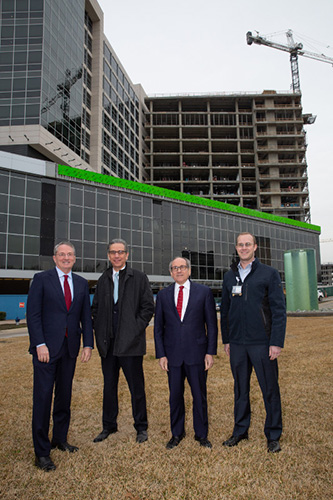 Leadership group in front of CUH tower