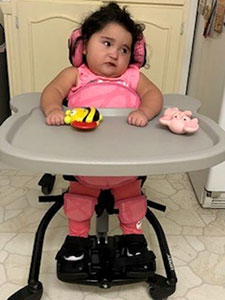 A terminal disease has taken most of Elizabeth Delacruz’s mobility. She can’t stand or hold her head up without support.