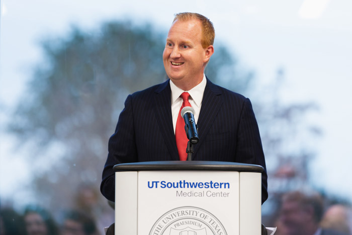 Man standing at podium