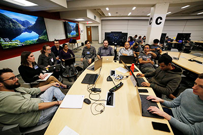 hackathon Team at Conference Table