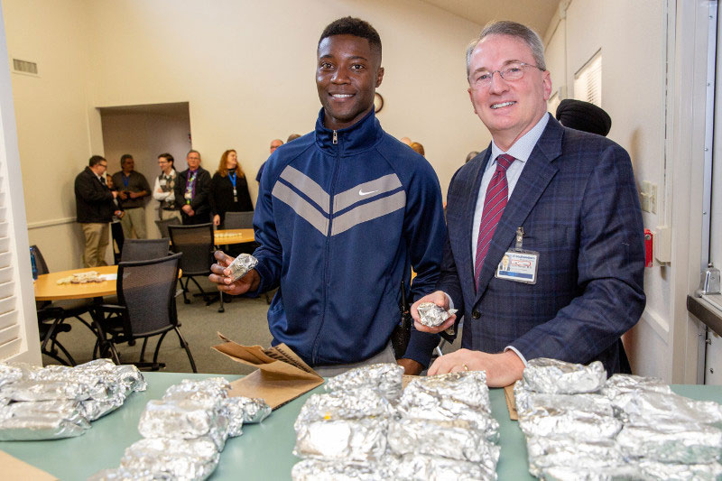 Frank Okafor and Dr. John Warner with tacos