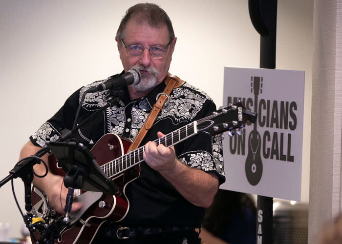 Sam Baker with Musicians on Call entertained the guests with music.