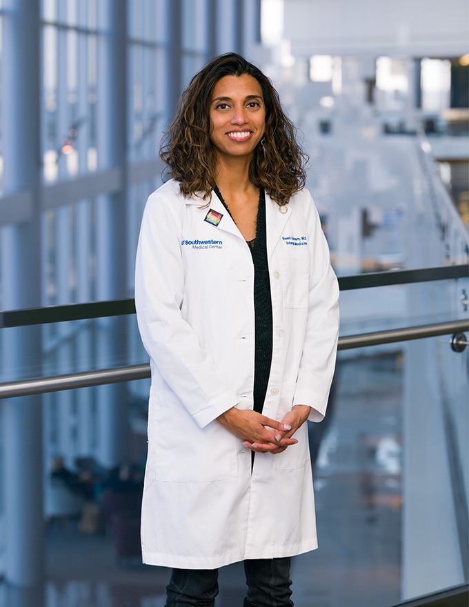 A woman in lab coat