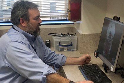 Man sitting in front of computer