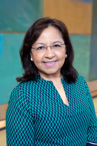 Woman with glasses and brown hair