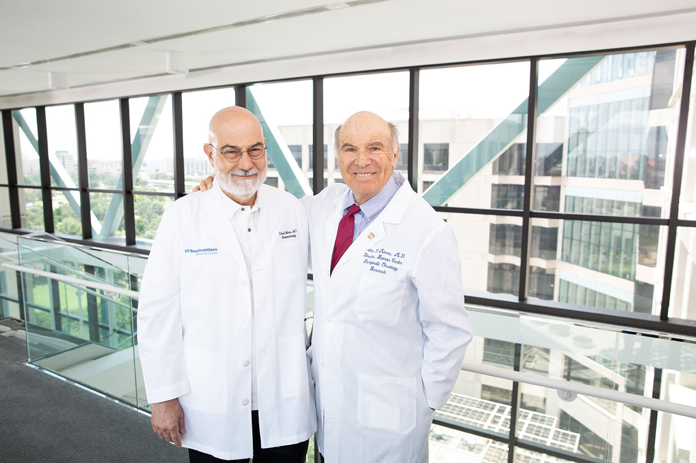 Two men in white lab coats