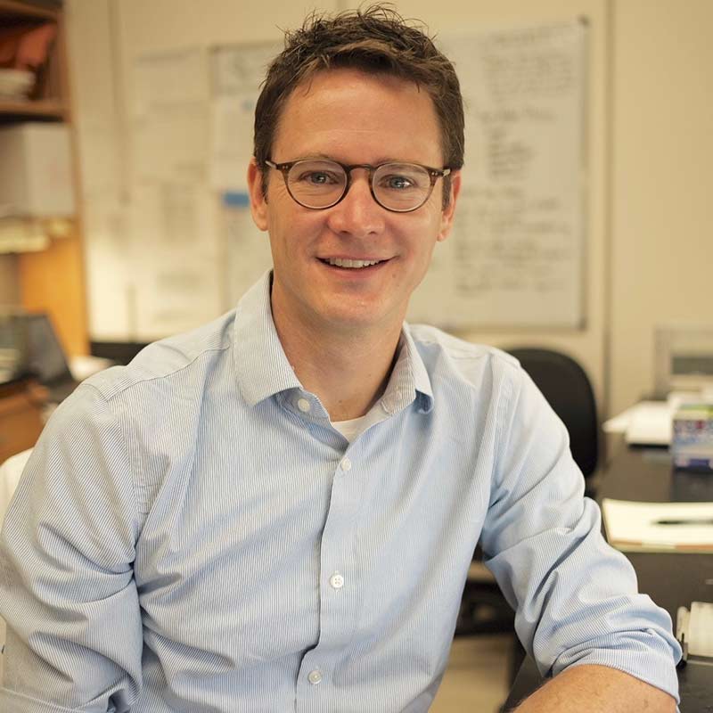 Man in glasses in library