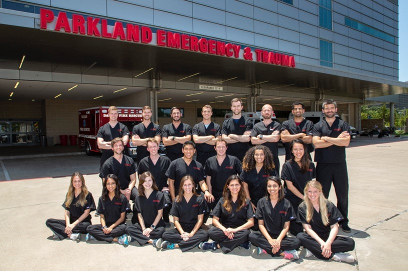 nurses standing in front of Parkland Memorial Hospital.