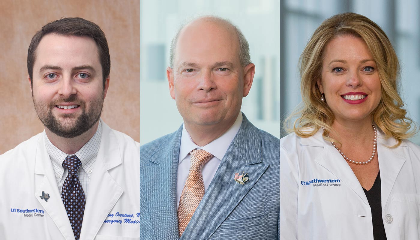 Three people in white lab coats