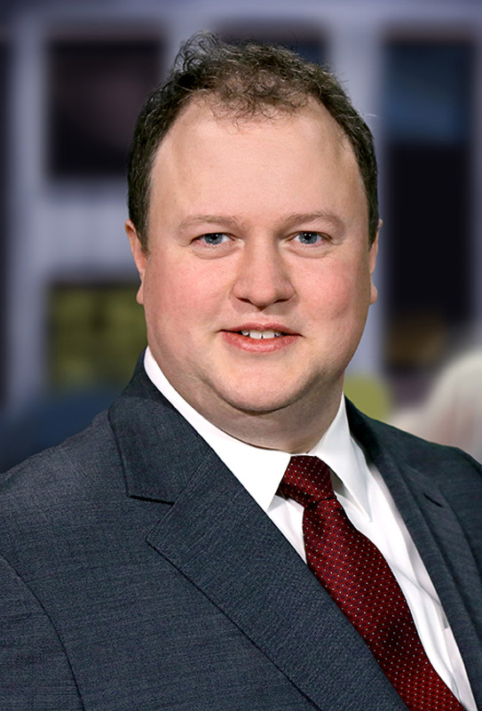 Man in suit, red tie