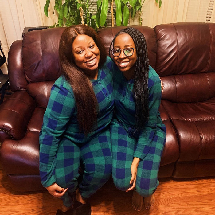 Two women in green and blue pajamas