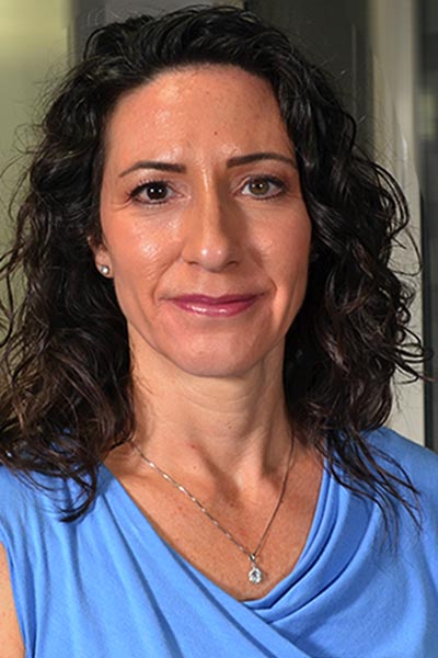 Woman in light blue blouse