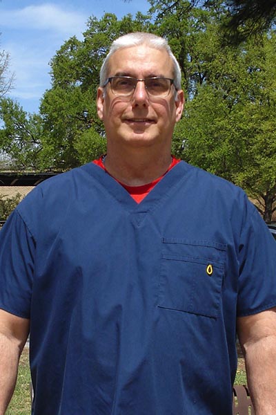 man in blue scrub top