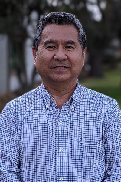 Man in striped button down shirt