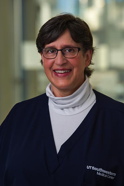 Woman in blue scrub top