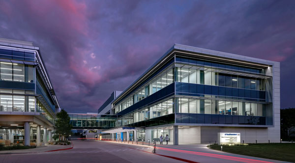 Render of a building against a dramatic purple sky