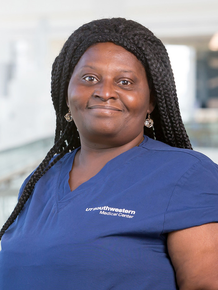 Woman wearing blue scrubs