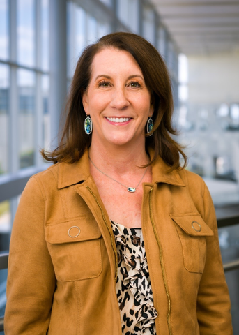 Woman wearing lab coat