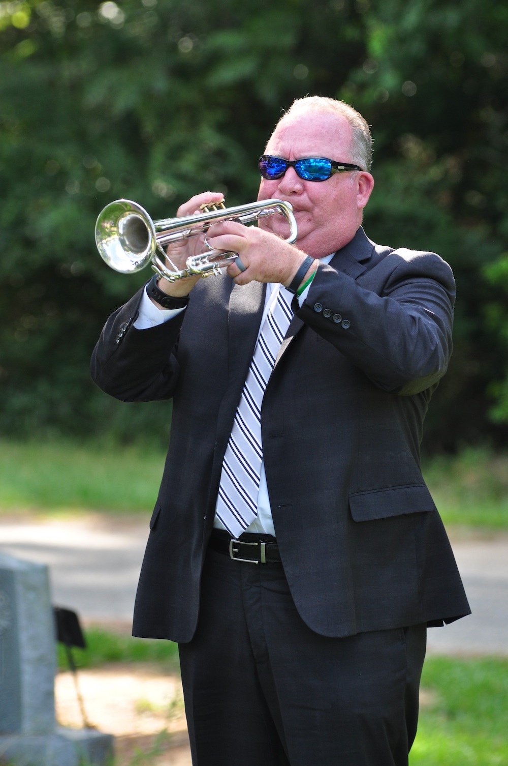 Tim Ervin plays taps