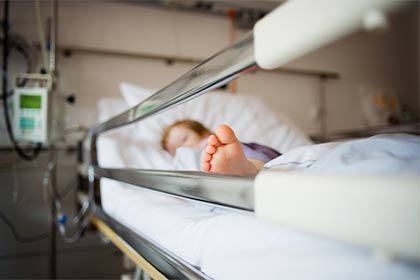 image of child in hospital bed