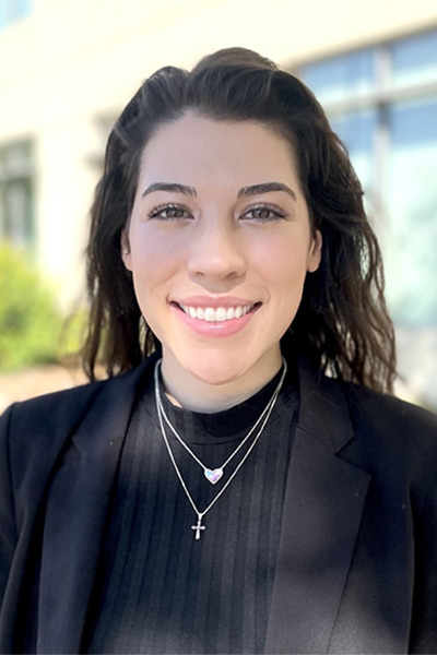 woman dressed in black shirt and black blazer