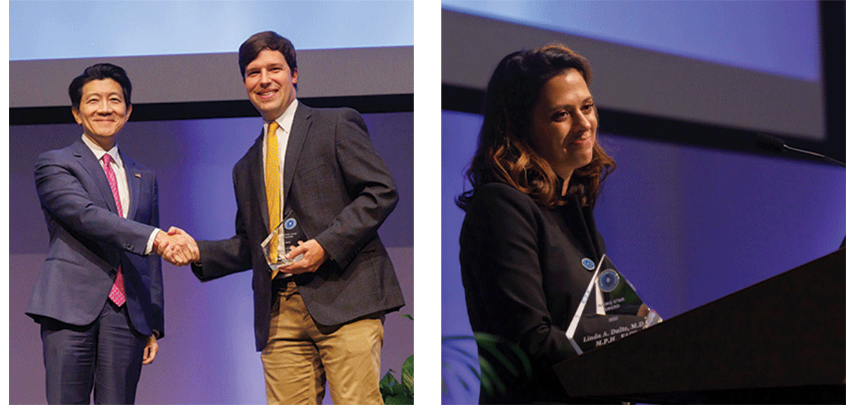 man on stage, woman at podium 