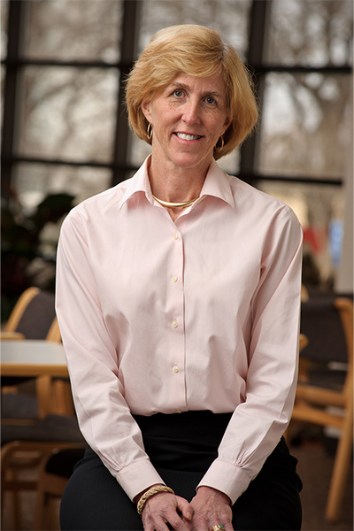 woman in pink shirt