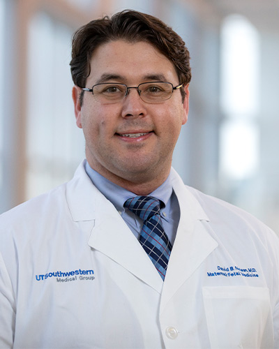 man in white lab coat 