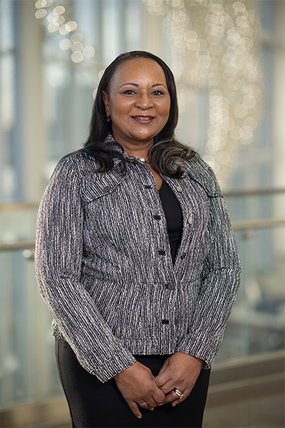 woman in black and white suit