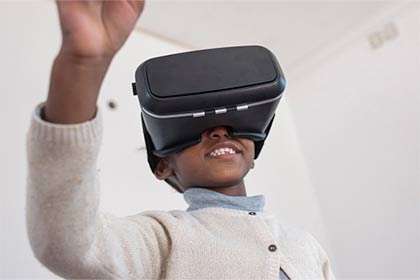 child in vr headset