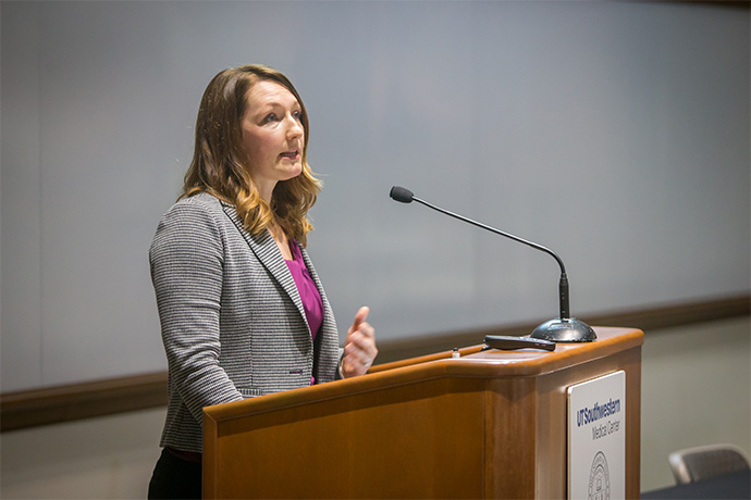 Staci Shearin, M.P.T., Ph.D., Associate Professor in the School of Health Professions, opens the symposium.