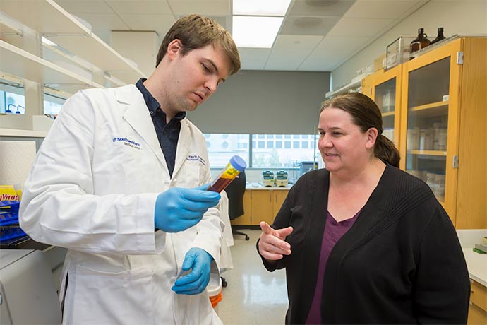 man and woman in lab