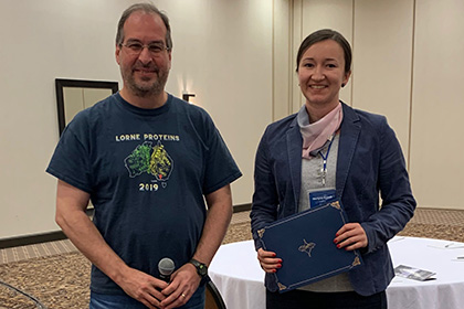 Ms. Kosno-Vega with her mentor, Michael Rosen, Ph.D., after receiving the Best Poster Award.