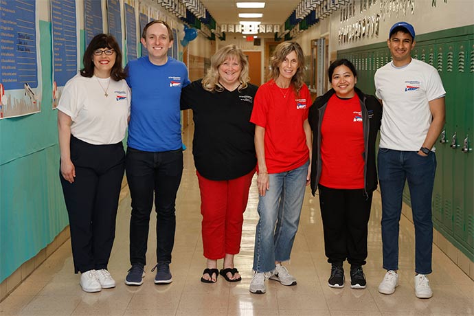 group of people between lockers