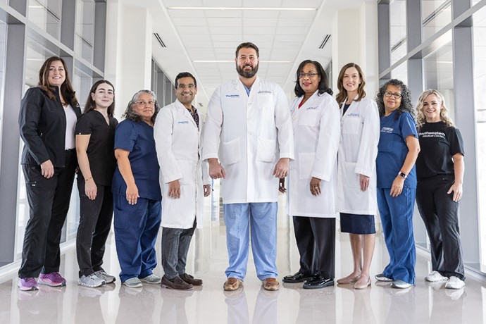 Dr. David B. Nelson (center) with the extending Maternal Care After Pregnancy (eMCAP) team.