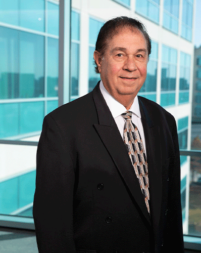 man in black suit, tie, white shirt