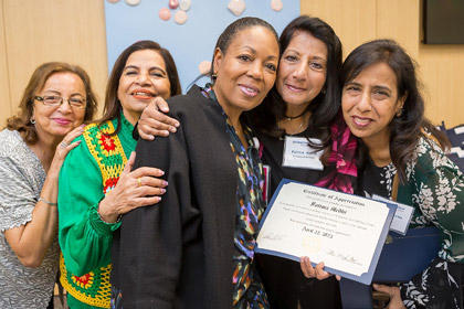 Five women holding certificaties