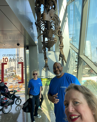 people standing with skeleton