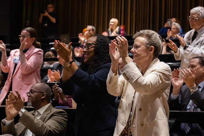 Celebration of Excellence in Education wall of honoree photos