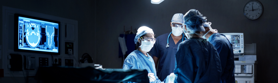 doctors in operating room performing surgery