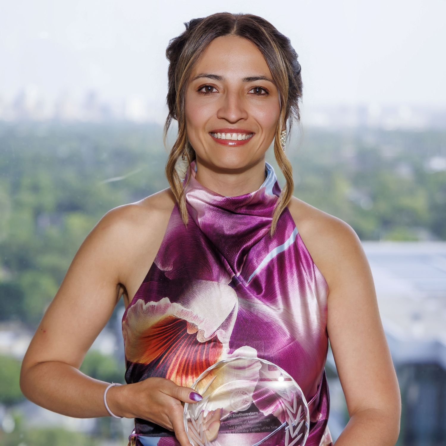 Ingrid Moreno Duarte, M.D. holding award