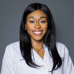 Headshot of Uju Momah, MD